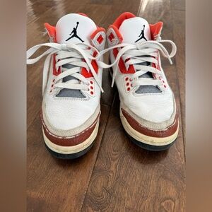 Nike Kids air Jordan’s White and orange Sneakers